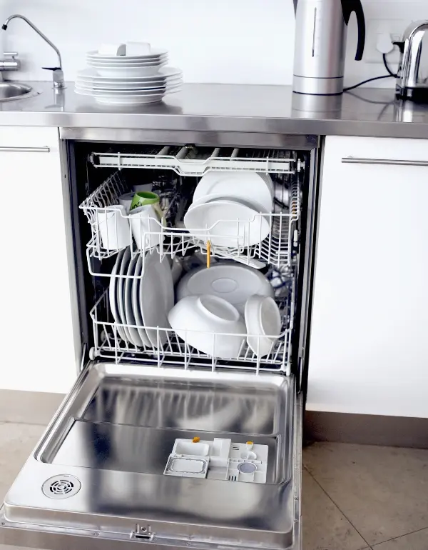Samsung dishwasher loaded with clean dishes, showcasing efficient interior organization and ready for use.