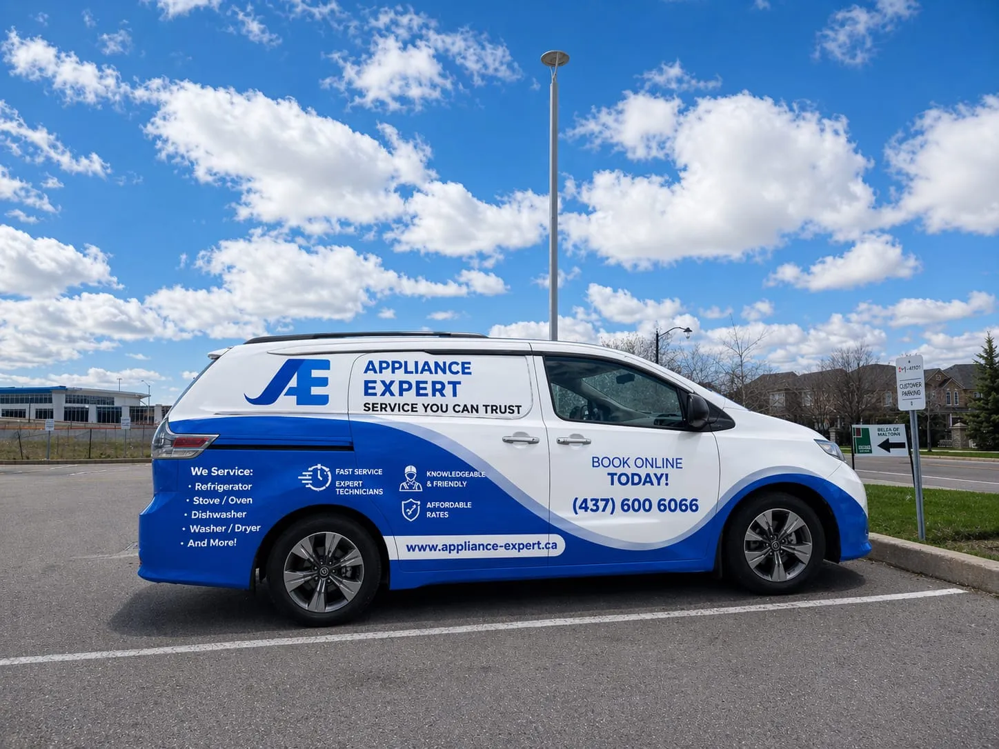White and blue service van for Appliance Expert appliance repair